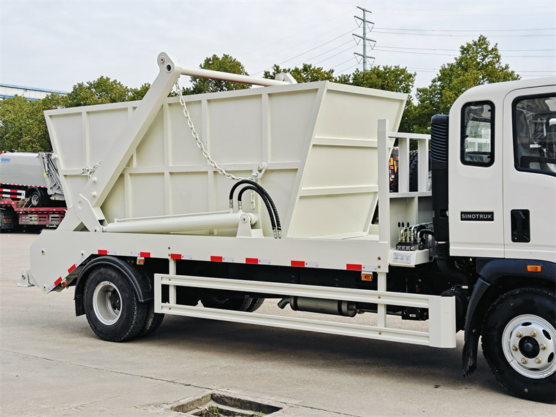 HOWO RHD skip loader garbage truck