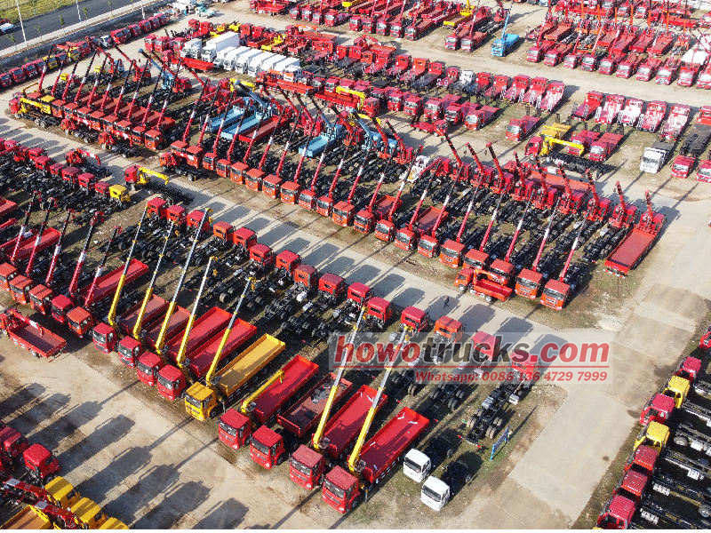 CS TRUCKS boom crane vehicles parking lot